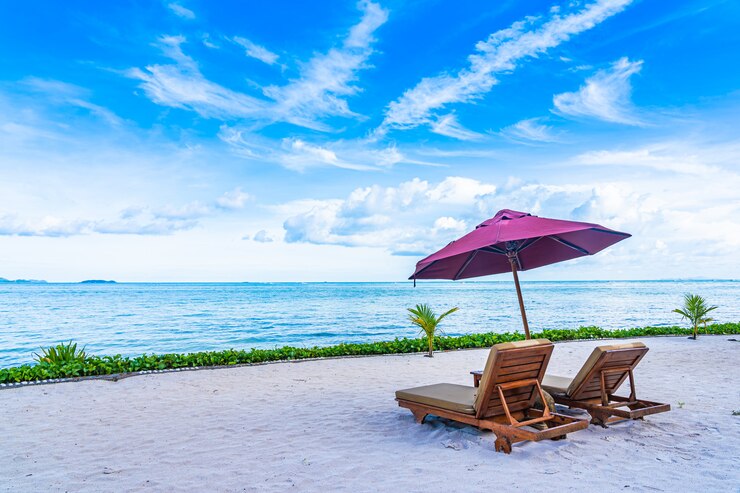 How to Choose Perfect Beach Cabana Best Guide in 2025 5 beautiful-landscape-beach-sea-ocean-with-empty-chair-deck-umbrella-nearly-coconut-palm-tree-with-white-cloud-blue